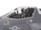The pilot figure has headgear with the helmet mounted display (HMD).