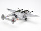 The classic P-38 form features twin booms extending from behind the engine nacelles, flanking a central cockpit.