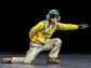 The Shooter is captured in highly realistic pose, giving the signal for the F-14A to begin its launch from the aircraft carrier.
